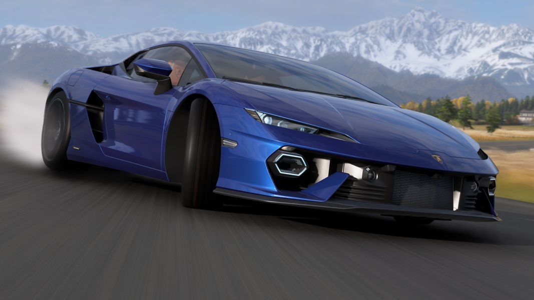 Blue supercar speeding along a mountain road with snow-capped peaks in the distance.